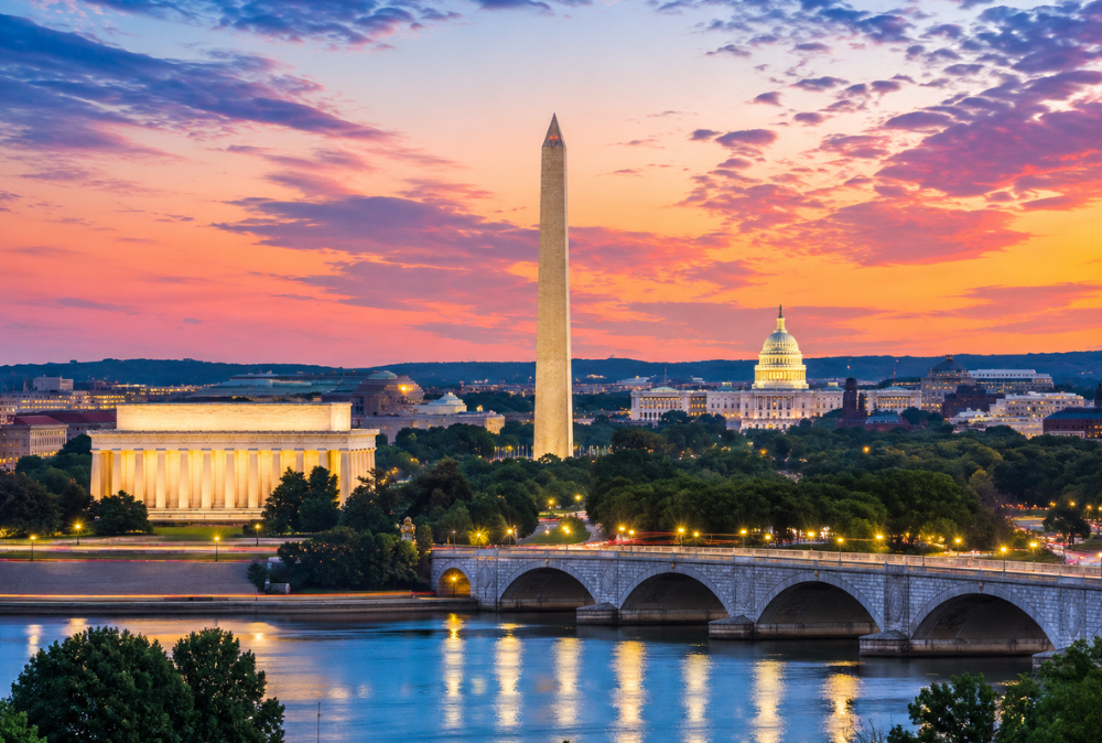 Washington DC across the potomac from Virginia with the Washington Monument and Lincoln Memorial and Americas National capitol building